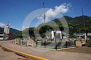 Plaza de Armas city of Tingo Mari­a with buildings with a, Beautiful Peruvian jungle with green fields and long roads. Peruvian