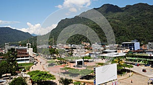 Plaza de Armas city of Tingo MarÃ­a with buildings with a, Beautiful Peruvian jungle with green fields and long roads. Peruvian