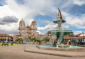 Plaza de Armas with Inca Fountain and Compania de Jesus Church - Cusco, Peru photo