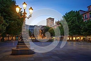 Plaza de Bib-Rambla Square at night with Cathedral Tower - Granada, Andalusia, Spain