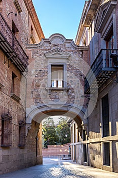 Plaza de la Villa passageway, stone medieval gate on Calle de Madrid, Spain.