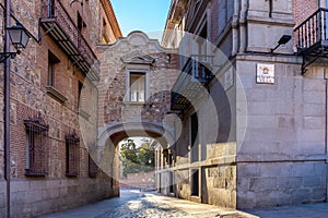 Plaza de la Villa passageway, stone medieval gate on Calle de Madrid , SPain photo