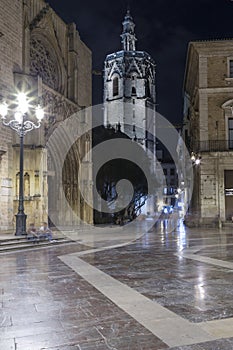 Plaza de la virgen with partial view of the cathedral and el miguelete, bell tower of the cathedral, Valencia, Spain