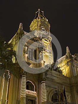 Plaza del Ayuntamiento by night in Fallas, Valencia photo