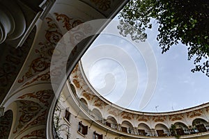 The Plaza del Cabildo is located in the Arenal neighborhood of Seville, Spain