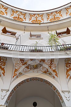 The Plaza del Cabildo is located in the Arenal neighborhood of Seville, Spain