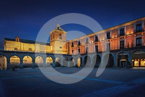 Plaza del Mercado Chico Square with Church of Saint John Baptist (San Juan Bautista) at night - Avila, Spain photo