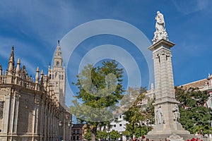 Plaza del Triunfo at the Cathedral of Saint Mary of the See in Seville, Gothic cathedral, with the skulpture