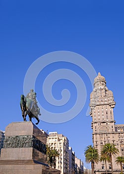 Plaza Independencia Square with monument of General Artigas and the Palacio Salvo in background, Montevideo, Uruguay photo