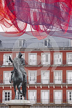 Plaza Mayor square with sculpture. Spanish architectural heritage. Spain