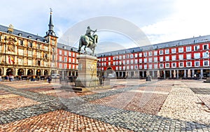 Plaza Mayor with statue of King Philips III in Madrid, Spain