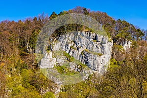 Plazowki Rocks limestone wall above Pradnik Valley Dolina Pradnika within Jura Krakowsko-Czestochowska upland in Lesser Poland