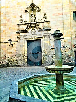 PlaÃÂ§a Sant Felip Neri. Historic corner of Barcelona, time, romantic corner and beauty  photo