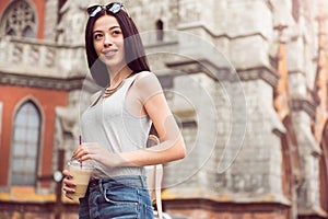 Pleasant woman drinking coffee