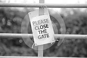 Please close the gate warning sign.