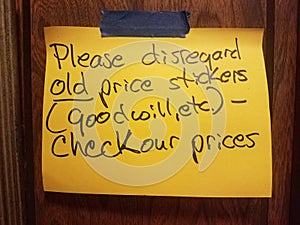 please disregard old price stickers sign at estate sale