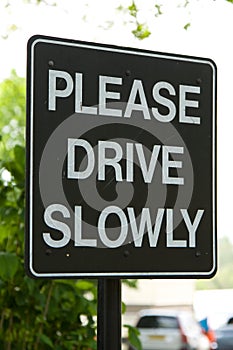 Please Drive Slowly Sign