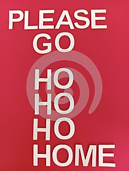 Please go home fun Christmas message on a red background