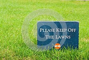 Please keep off the lawns Ã¯Â¿Â½ stone sign in the park photo