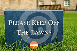 Please keep off the lawns Ã¯Â¿Â½ stone sign in the park photo