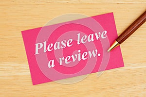 Please leave a review text on pink card with pen