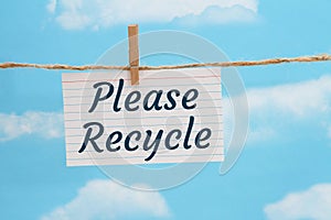 Please Recycle message on a white index card