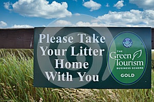 Please take your litter home with you sign