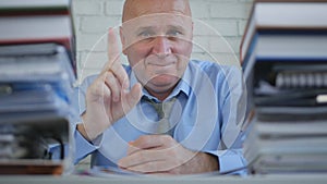 Pleased Businessman Image Warn With Finger Up Meaning Attention