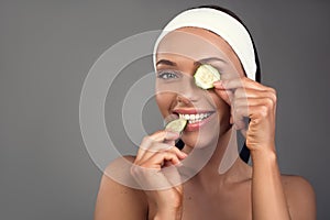 Pleased lady taking care of skin health