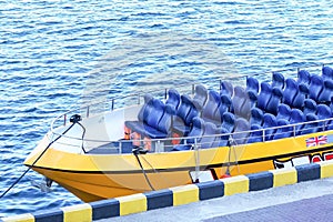 pleasure boat, barge at sea pier . Summer rest.