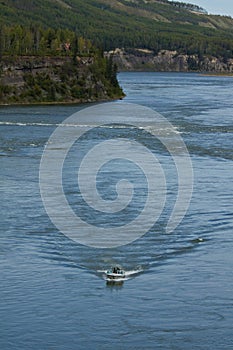 Pleasure boat cruises up the mighty Peace River, northeastern BC