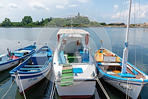 Pleasure boat among fishing boats at the pier of old Sozopol in Bulgaria