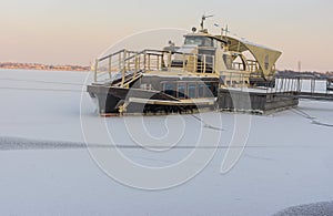 Pleasure boat frozen in on a Dnepr river