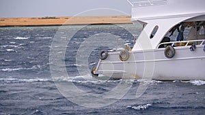 Pleasure Boat with Tourists is Sailing in the Storm Sea. Egypt, Sharm El Sheikh