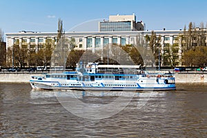 Pleasure boats on the background of Berezhkovskaya Embankment in Moscow