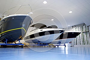 Pleasure boats in garage photo