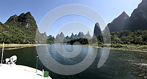 Pleasure Boats on The Li River in The Karst Mountains. Guilin, Guangxi, China. October 30, 2018.