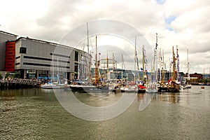 Pleasure boats moored in the marina at Belfast`s Titanic Quarter beside the Odyssey Arena