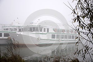 Pleasure boats on the pier, autumn morning