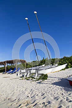Pleasure catamarans on the beach in Santa Maria.Cuba.