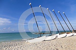 Pleasure catamarans on the beach in Santa Maria.Cuba.