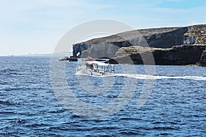 Pleasure craft at the island Comino