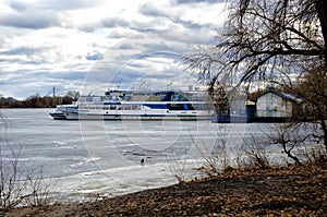 Pleasure river ship in the winter parking