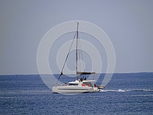 Pleasure sailboat on a ocean