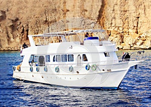 pleasure yacht anchored off the coast of the Egypt. Hot sunny day