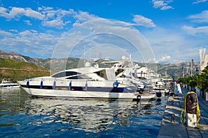 Pleasure yachts at pier in Dukley marina near promenade of Budva, Montenegro