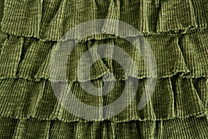Pleated skirt fabric fashion in green closeup