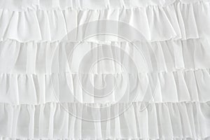 Pleated skirt fabric fashion in white closeup photo