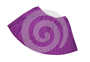 Pleated skirt purple color isolated on a white background. Fashionable women`s mini skirt. Close up