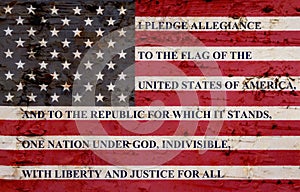 The pledge of allegiance on weathered flag photo